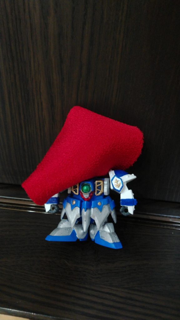 強風であおられる