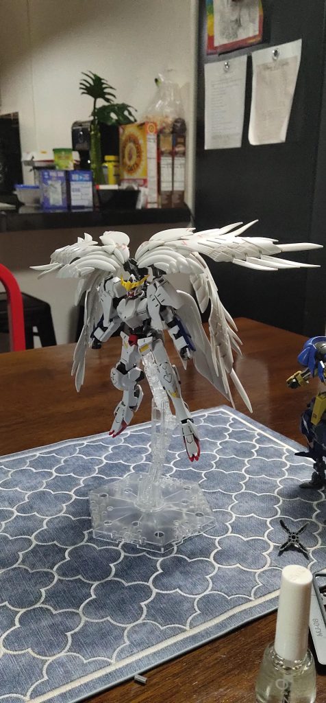 I used the backpack of Astaroth and drilled two additional 3mm holes to be able to connect four pegs. I used Kotobukiya MSG joints and connectors to hold the the two pairs of wings together. Sacrificed two units of RG Gundam Wing Zero EW.
