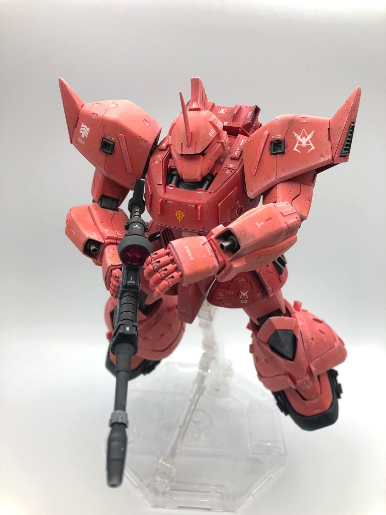 　次期後継機になるべく開発されていたMS-14は、ビームライフルの携行火器サイズでの生産性が満たされていないだけで、想定の目標値を達成して生産可能な状態であったが、連邦の白いMSショックから、ビームライフルの運用は必須事項とされてしまったため、生産および前線配備が79年の年末まで遅れてしまった。