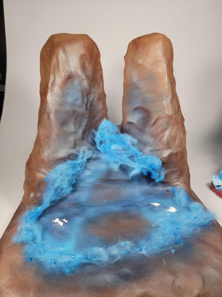 台座のみ。グラデーション塗装と綿を配置。完全にこれ専用です。イメージはファイターの輝きでの戦闘場面ですが、あまりにも粘土まんまですね汗