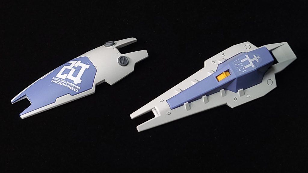 制作小話ヘイズル改の紺色のパーツに水性サ―フェイサーを吹いてから筆ですみれ色に塗装しました塗装専用の部屋がないのでにおいの少ない水性ホビーカラーには助けられていますジムコマンド型のシールドには水転写デカールをペタリ右肩はコトブキヤのウェポンユニット36 ミサイル&レドーム、右腕はHGUC ガンダムMk-Ⅱ（エゥーゴ仕様）のものです一部の写真はカメラアイをブラックライト 365nmで光らせています使用キット・HGUC 1/144 ヘイズル改・HGUC 1/144 ガンダムMk-II（エゥーゴ仕様）・HGBC 1/144 次元ビルドナックルズ「角」・コトブキヤ KOTOBUKIYA MW36 M.S.G モデリングサポートグッズ ウェポンユニット36 ミサイル&レドーム 最後にGUNSTAさんのコンテストに参加できるのがたのしくて制作したガンプラですカラー変更とミキシングをした作品ははじめてかもしれませんやはり組みあがったときはうれしいですねコンテスト対象のキットはまだあるのでアイデアが浮かべばどんどん参加していきたいですそれではここまで見ていただいてありがとうございましたみなさんお体には気をつけてお過ごしくださいませ