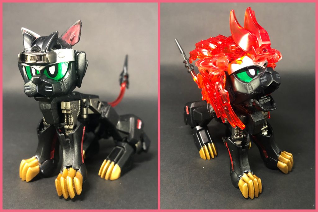 猫型MA・タンゴ猫型のやや小型のMA。イナバほどではないが戦闘能力は低く、暗闇でも見通せる目による視覚的な情報収集と、鋭い爪での攻撃、しなやかで柔軟な動きで敵を翻弄するなどの役割を持つ。こちらは少年の様な口調のクセの強いAI (CV: 津久井教生)で、イナバより少しお兄ちゃんでずる賢い感じの性格。タンゴという名前は、「黒猫のタンゴ」という歌から。ちょっと古い。兎がイナバ=因幡=地名に因んだ名前なので、それに則って地名とも取れるタンゴ(丹後)にしました。そういえばロックマンに出てくる猫型ロボもタンゴですね、他のサポートロボに比べると影が薄いですけども。ーーーーーー猫型MA・タンゴ火獣形態炎の力を解放し、ライオンのようなタテガミを形成した形態。全体的な能力値が上昇し、より戦闘向きに。また、咆哮によって相手を威嚇できるようになった(タンゴ本人的には、これが一番嬉しいらしい)。