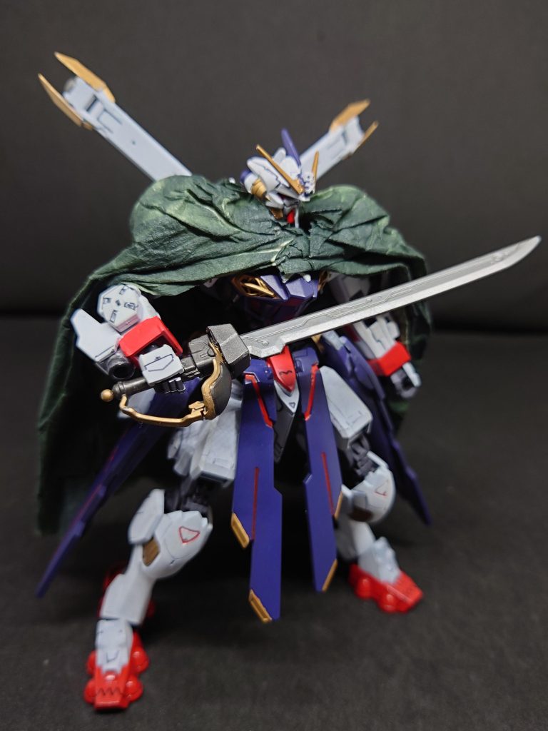 ナノラミネートザンバークロスボーンガンダム系統の武装ビームザンバーの刃をアスタロトオリジンのγナノラミネートソードの刃を移植したものグリップを握ることによって任意にナノラミネート反応を起こし斬撃の威力を上げるその威力はＭＡを両断するほどの斬撃を繰り出せる3回まで使用が可能