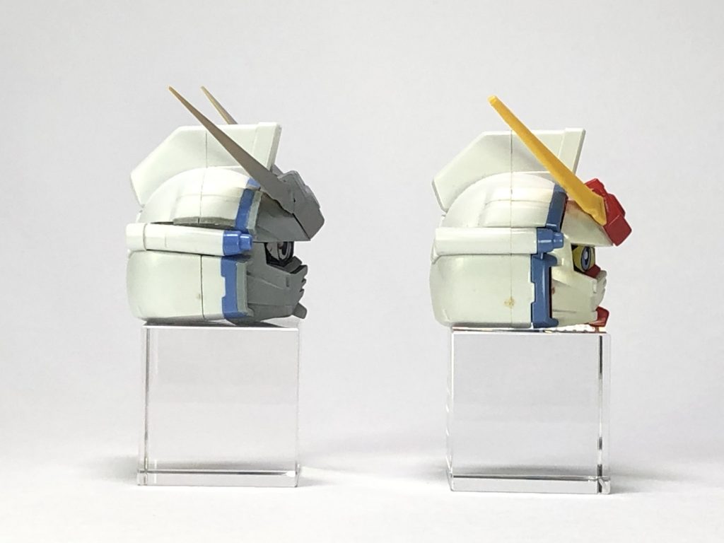 今回1番のこだわりポイントの頭部改修です。・フェイス、隈取、ヒサシを形状変更、目の部分も分割し交換式に・アンテナ取り付け位置を上方に移動し、基部も形状変更・青いダクト部とバルカンは、切り刻んで全体的に下方に移動・最終的にはトサカ部分も形状変更し、頬や側頭部のモールド類も作り直しました。