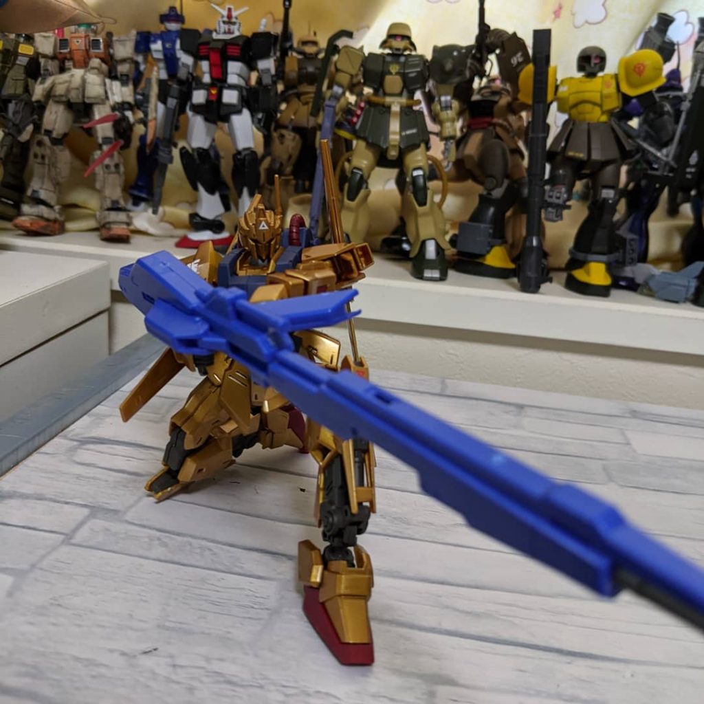 外見こそ変化はないが、バックパックの推進力の向上や機体の軽量化が僅かながら成功しており、従来の装備の他にハイパーメガランチャーを持ち運び可能にすることが可能になっている。 