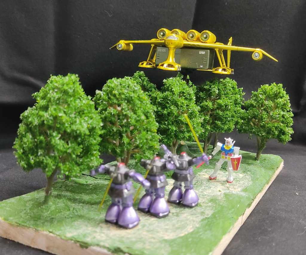 迫撃！トリプル・ドムの1場面を