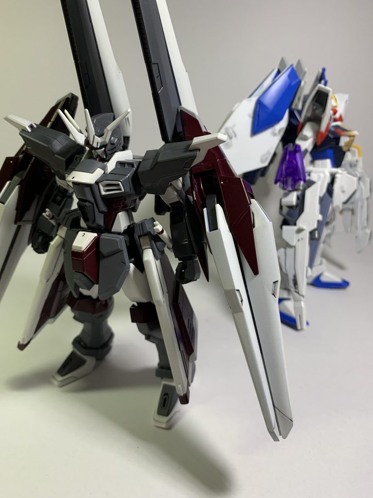 (現在制作中のフリーダムと一緒に)本機はメサイア攻防戦後ラクス・クライン陣営がザフトに加入し、ザフトがストライクフリーダムの戦闘データを解析、応用することで完成した。オリジナルではウイング部に取り付けられていたスーパードラグーンだったが地上戦でも有効活用できるようにすることも視野に入れ、次世代の機体に搭載されるシステムの試験機としても開発された。そのシステムはモビルスーツの新たな動力源となるもので、核は搭載せず、エネルギーを半永久的に生産させるもの(太陽炉ではないです。)であり、そのシステムの限界を知ることを目的として、あえてエネルギー消費が激しい高火力な機体として完成した。