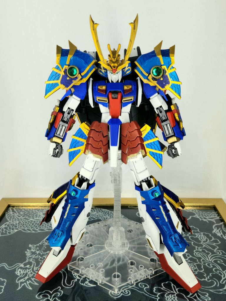 「武者好きなアナハイムの技術者が、Ζガンダムの強化プランを考え具現化。武者にするために可変機構を廃するという大胆設計な機体」というオラ設定です。