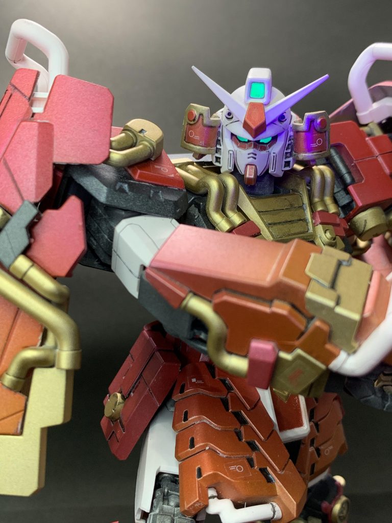 以上、MG真武者頑駄無でした。前作同様最後の余談ですが、今回の製作は8月末日から開始して約20日弱かかりました。エアブラシ塗装がだいぶ慣れてきたのでこれからもこの調子で効率を上げていきたいと思っています。…が、今日までの間にMG エクシアリペアIII、RG Hi-νガンダム、HG ナイチンゲールを買ってます。僕算数苦手なんでよく分からないんですが、何でか箱が増えてるんですよね…。こういうのを罪プラと呼ぶと昔ばっちゃが言ってました(言ってない)。ともあれ、ご覧頂きありがとうございました!次回の罪プラ崩しにどうぞご期待ください!