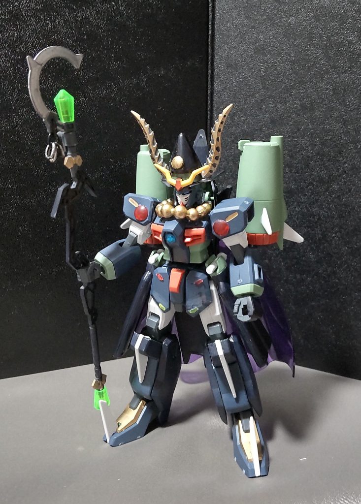 ○妄想設定などGBNにて、とあるフォースが用意したチャレンジクエスト用に制作されたボスキャラ兼、チームのリーダー機でもある。あらゆる魔法を使え、更に召喚魔法も使ってくるといった、最強の魔法使いといった設定となっている。リーダーは結構な中二病で変な言動がよくあるが、メンバーは特に気にしていない模様。