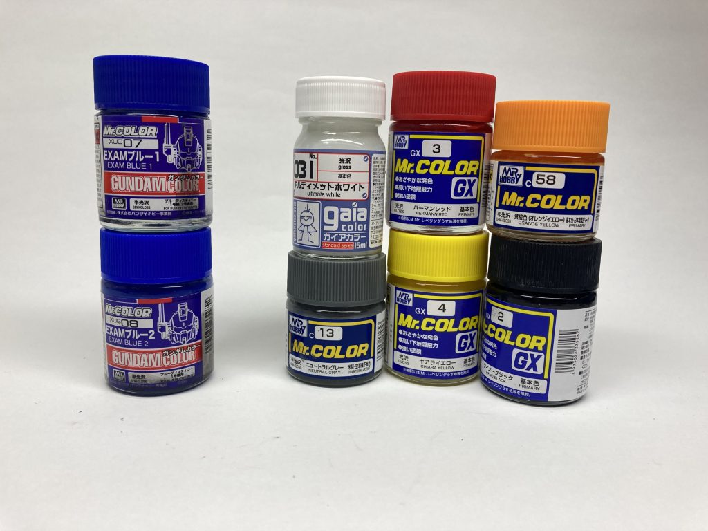 カラーレシピ (G)・・・ガイア (C)・・・クレオス本体白・・・(G)アルティメットホワイト本体青・・・(C) examブルー1と2を50%ずつ本体オレンジ・・・(C)黄橙色本体黄・・・(C)黄橙色を下地に(C)キアライエロー本体赤・・・(C)ハーマンレッド関節、武器色・・・(C)ニュートラルグレー+(C)ウィノーブラック