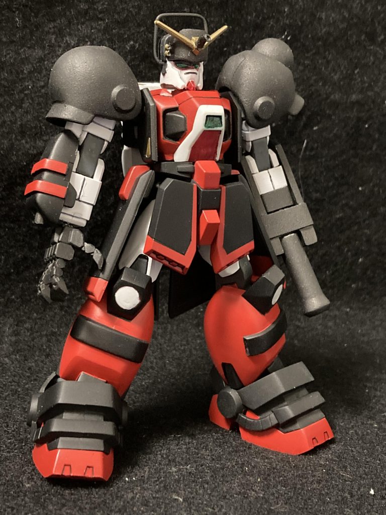 ガンダムイーハトーブネオ岩手代表のモビルファイター。本機はネオ岩手を守護するモビルファイターでありケンジ・ミヤザワの志を持った心優しきガンダム。装甲にネオナンブニゥム合金を採用することで驚異的な防御力と保温性を誇り、南部鉄器の如き防御力は攻撃力にも作用している。