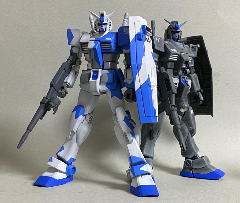 既出ロービジ風塗装HGUC (No.21)と。ロービジ風は103号機、これは104号機です。この2機は同じ部隊の機体で、104号機も、通常は同様のロービジ塗装ですが、基地祭のスペシャルマーキングとして、このカラーリングに塗装されました。嘘です。昨日考えた設定です。