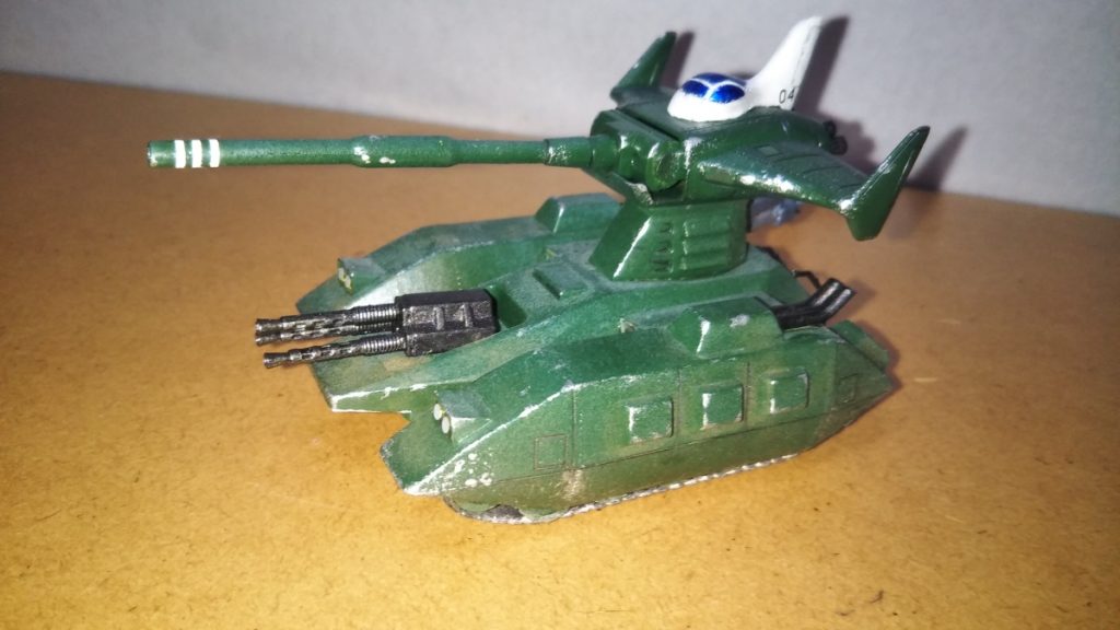 　最後までご覧いただき、ありがとうございました。　考えたら人生で初めて製作したこのキットを皮切りに、これまでに３体、旧キットのマゼラアタックにチャレンジしたのですが、まともにマゼラアタックとして完成させたのはこれだけです（あとの2つは先ほどのM１戦車発展型とザクタンクに改造してしまったので・・・）。　キットの素体が良いだけに、そのまま組み立てても十分見応えのある作品に仕上がりますね。　旧キットは、正直モビルスーツに関しては出来に当たりハズレがありますが、マゼラアタックや艦船類、ガウやモビルアーマーは今の目で見ても十分通用する名キットが揃っていると思います。　ご興味のある方は是非、非モビルスーツの旧キットにチャレンジしてみてください。　想像以上の出来に驚くこと請け合いです！　さて、50投稿目記念作品「辞令。第04MS小隊を、オデッサ基地防衛に派遣する」の個別投稿も、残すところあと1つとなってしまいました。　ですが、ラストの旧型ザクはちょっとした追加武装を製作中なので、もう少しお待たせしてしまうかもしれません。どうかご了承ください。　最後になりますが、本作品をご覧になっての感想などいただけますと幸いです。