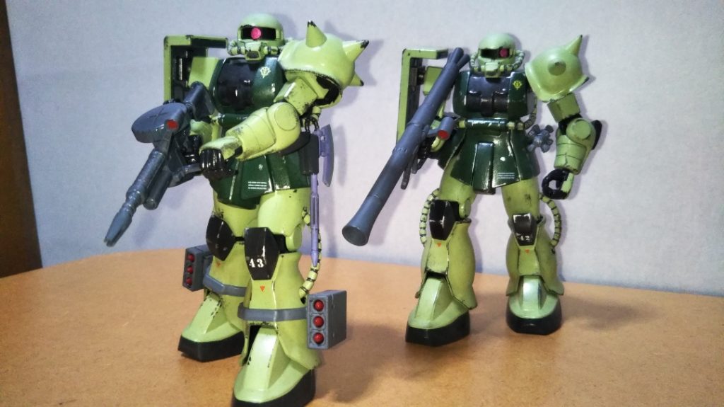 最後までご覧いただき、ありがとうございました。 ゼットコンを挟んでしまいましたが、なんとか個別投稿を開始することができました。 やはりザクは、複数機で並べると絵になりますね。 以前模型雑誌で「プロのモデラ―にとって、ザクは正直雑誌に乗せる作例としてはあまり作りたくない。みんなザクは大好きな機体だけど、それだけにいろいろな人を満足させる作品を製作するのは非常に難しい」というような記事を読んだことがありますが、今回はなんだかその気持ちが少し分かったような気がします。 様々な表現や加工を受け入れることができる、まさにガンプラの王道だからこそ、真正面から取り組むといろいろ悩みますね。 今回のように、インターネットに公開してたくさんの人に見ていただくとなるとなおさらです。 ですがその分「自分の理想のザク」を目指して手を動かすというのもまた、モデラ―の醍醐味ですね。 最後になりますが、本作品をご覧になっての感想などいただけますと幸いです。