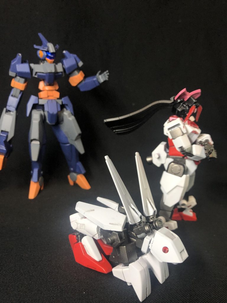 ハウンドのリーダーであるエージェント・クリアウォーター(以下A•CW)は、とあるダイバーの捜索依頼を受けていた。A・CW「今回の任務は、黒いコアガンダムを駆るイブキと名乗るダイバーの捜索だ。彼は個人ランク戦に突如として現れ、物凄い勢いで順位を上げていったかと思えば、ある日忽然と姿を消したという。どんな些細な事柄でも良い、まずは情報収集から始めよう。各自捜索に当たれ!」隊員「イエッサー!」捜索中………捜索中……捜索中………!?何かを発見した模様。A•CW「…ん?あれは、コアガンダムか?話を聞いてみよう。失礼、少し尋ねたいのだが。イブキという名のダイバーの事を知っているかな?君のようにコアガンダムに似た機体を使っているらしいのだが。」アカネ「イブキ…ですって…⁉︎」