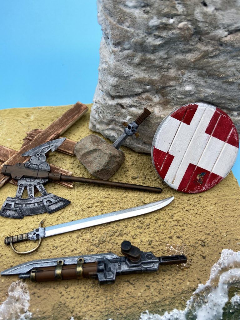 アクセサリ一覧。オノ、サーベル、銃剣、ラウンドシールドとバイキングらしさのあるものをチョイス。スカルウエポンズから選んだと思います。