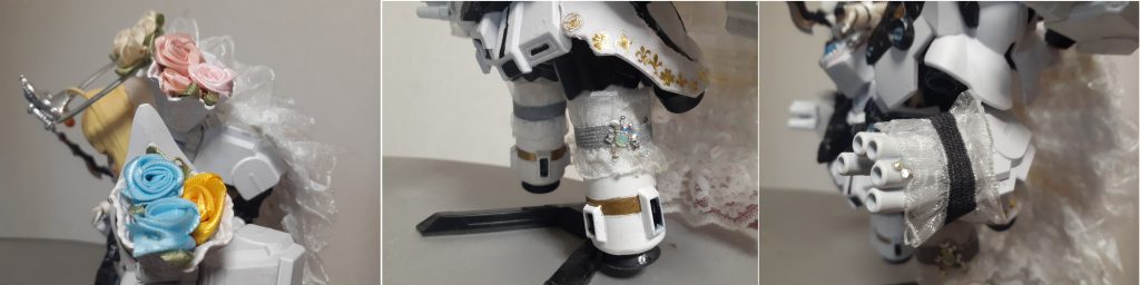 「おいおい避けるな。式の進行に穴が開いてしまうではないか！」そんな感じで無限に投げてくるブーケはお菓子系のアクセサリ用のコーン風素材を塗装して、造花を張り付けています。またプロペラントタンクが寂しかったので、ガータートス用のガーターをレース素材とネイルアクセ用のキラキラ素材で作成しました。花嫁さんなので、左薬指に指輪風にネイル素材を張っています。塗りの技術が良くなく、細部の色合いとか不満点は残っていますが、今回はこれにて一端のキリをつけてみた感じでございます。ご清聴、ありがとうございました！