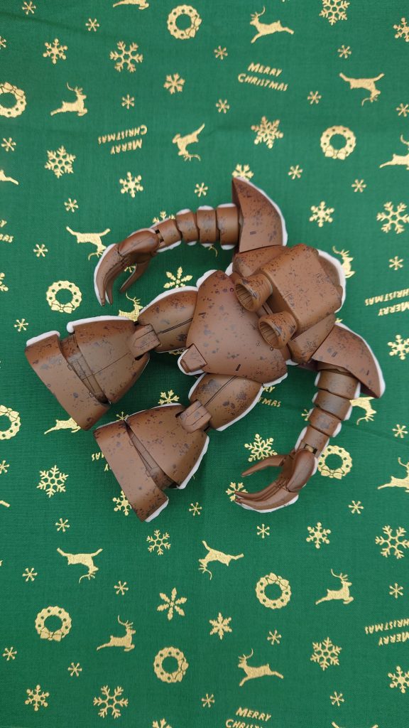 後ろ姿裏面全体には、クッキーを焼いた際に空気を含んでボコボコとした表面になるので、それをイメージした模様が入っています。