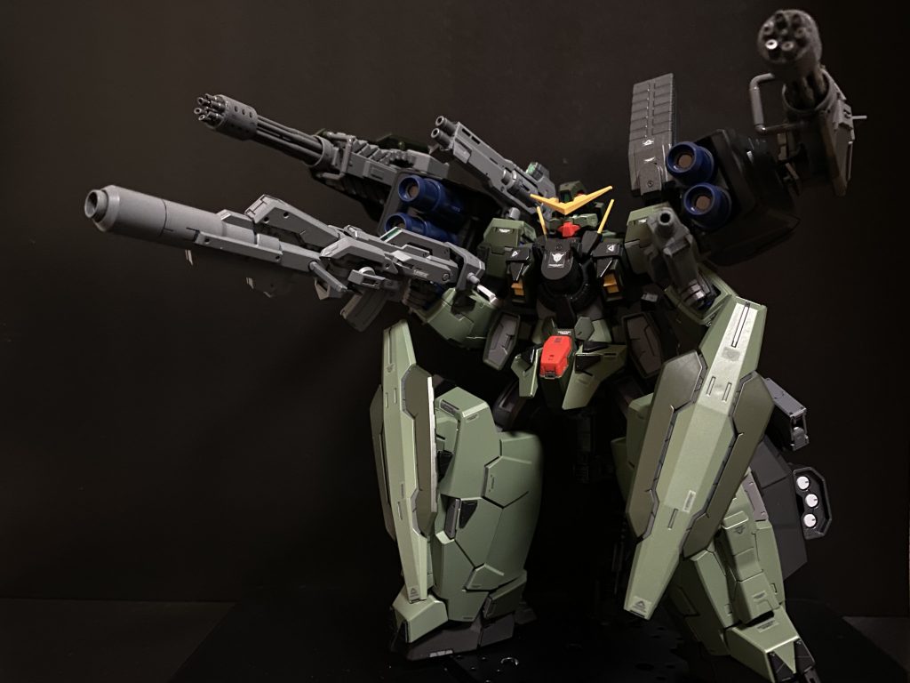 　本機は「ヴァーチェ」であるが、その機体性能は、ロックオンのスピード、一度に複数のロックが可能など、「デュナメス」などに近い射撃性能重視に調整されている。本機のドライブは、GNドライブ[T]、擬似太陽炉の為、粒子の色、ビームの色は赤となっている。当然、人体に対し有毒である。　機体名である「ゼルク」とは天使ゼルエルの別名。「神の腕」力、戦を司る。天使ケルヴィエルと同一視される。