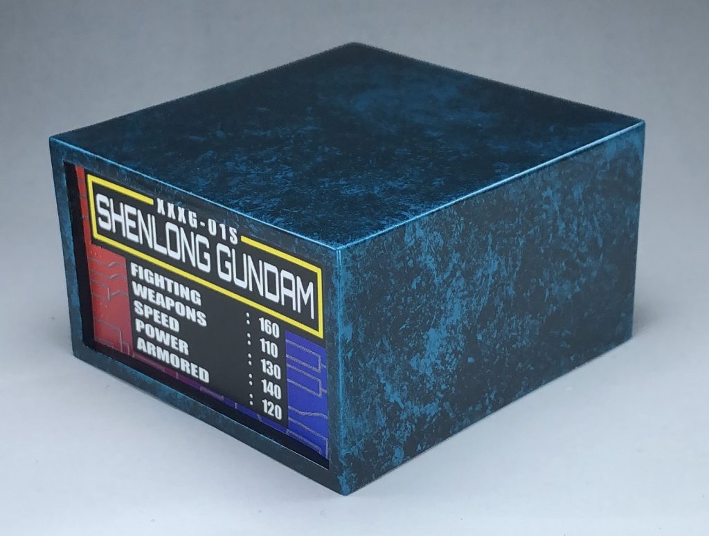 ディスプレイベースは宇宙をイメージした（？）ラップ塗装。名前と懐かしいアビリティポイントを乗せたシートは、カードゲーム、スパロボスクランブルギャザーのデザインをアレンジし、自作したものを貼り付けました。朝に思いつき、昼には塗装終わらせました。黒瞬着と促進スプレー、降ってきたアイデアに感謝^_^