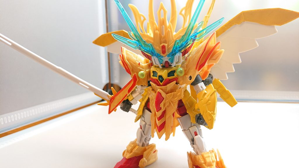 シャガの左肩の装甲が破壊される悟空の一撃は僅かながら彼に届いていたのだ！