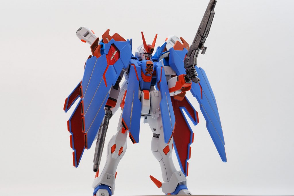 基本ベースはX1系統の機体を元に開発している。大きな違いとして、ぺこらが地球軍所属時代に搭乗していたF91を元にした最大稼働モードを搭載しており、胸部排気ダクトが新設計されている。また武装には従来のザン・バスターからバタフライバスターへと変更されている。