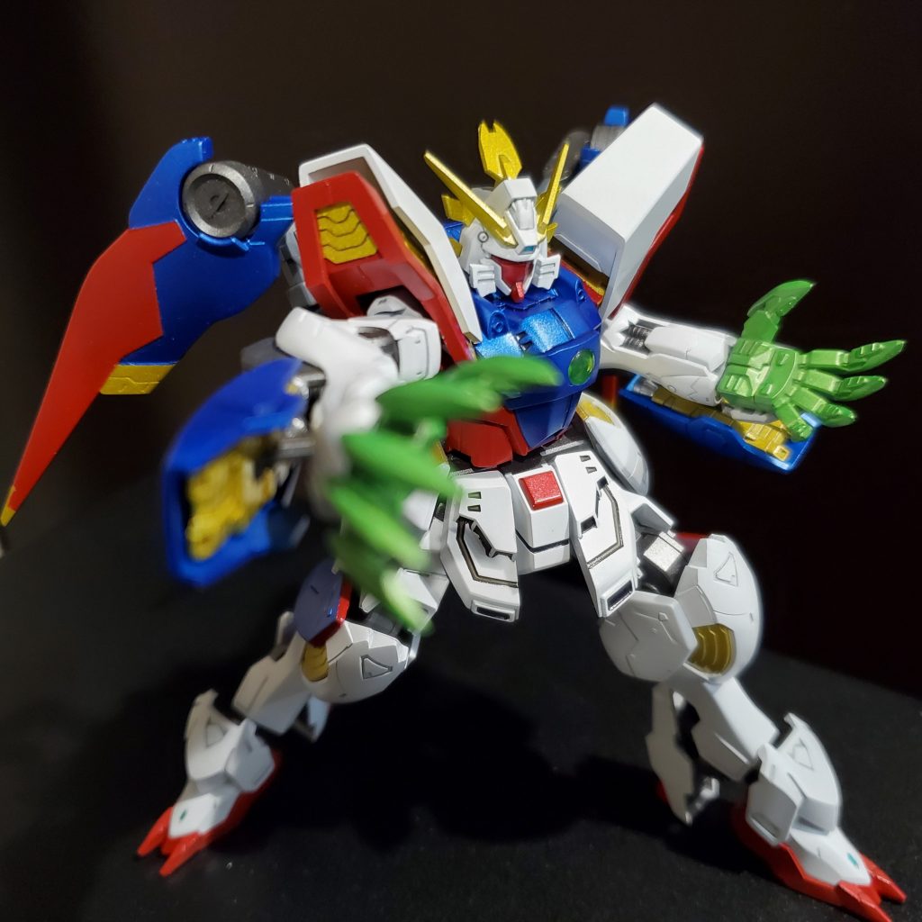 「シャァァィニング、フィンガー!」ポーズ。もとよりは強いでしょう、これは。肩の余白にはウェーブのディテールパンチを活用してみました!塗装白 ガイア Exホワイト黒 ガイア サーフェイサーEVOガンメタ赤 アクリジョン メタリックレッド青 アクリジョン メタリックブルー金 シルバーサフにクリアーイエローはじめ全部キャンディしようと黄色してすぐ断念しました(笑)