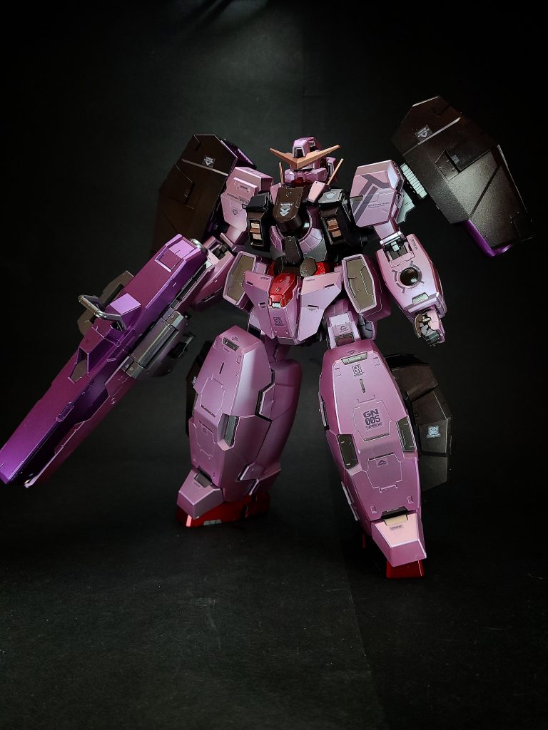 GNキャノン 背部に2基装備された可動式2連装ビーム砲塔。可動範囲が広いため、広域の敵への攻撃に適する[14]。GNキャノンとGNバズーカ双方の同時砲撃はヴァーチェ最大の攻撃となる[14]。グリップが備えられており、外装排除後のナドレでも携行火器として使用可能。GNフィールド発生器と一体化した構造になっている。