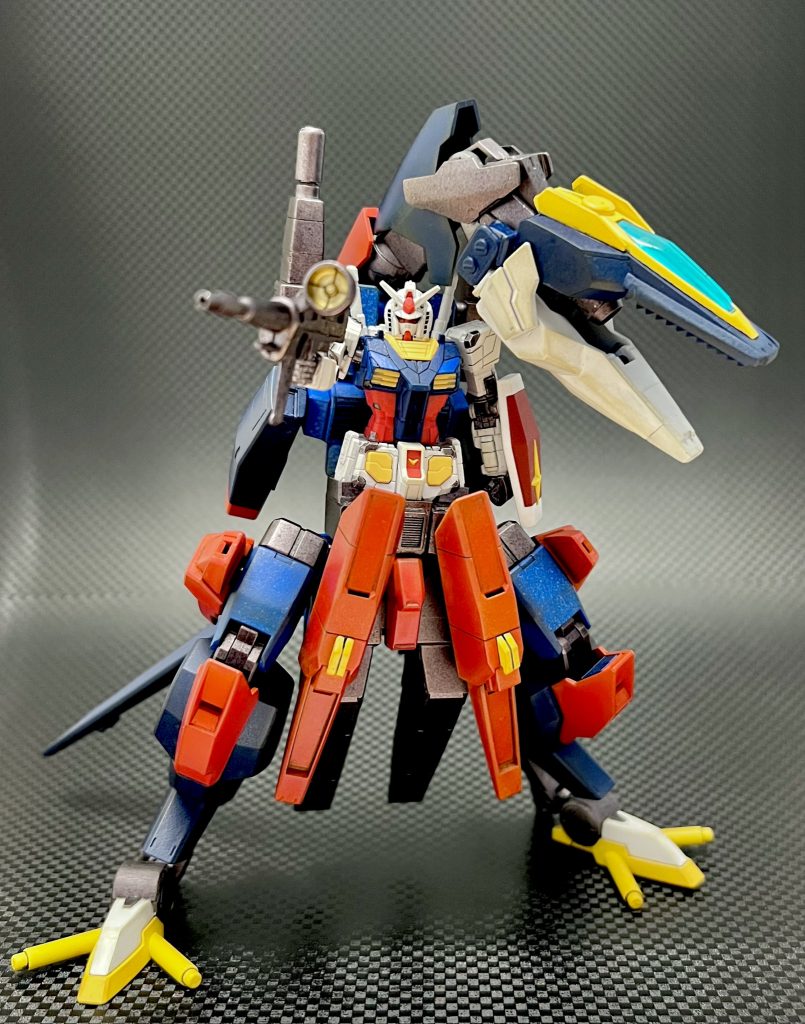 ▲合体状態本家Gアーマーの「ガンダム本体の戦力が無駄になってしまう問題」については、複数の創作を通じてそれぞれの解決策が出ているようです。私はガンダムの上半身の自由を残しつつ、下半身の(格闘能力の)強化ができるパワーローダーとしてのアレンジを目指しました。Gファイター(肉食恐竜)→Gアーマー(ゴジラなどの