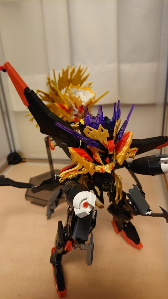 すかさず黄袍怪の背後に周り後頭部に金剛錫杖を力強く振り下ろして攻撃