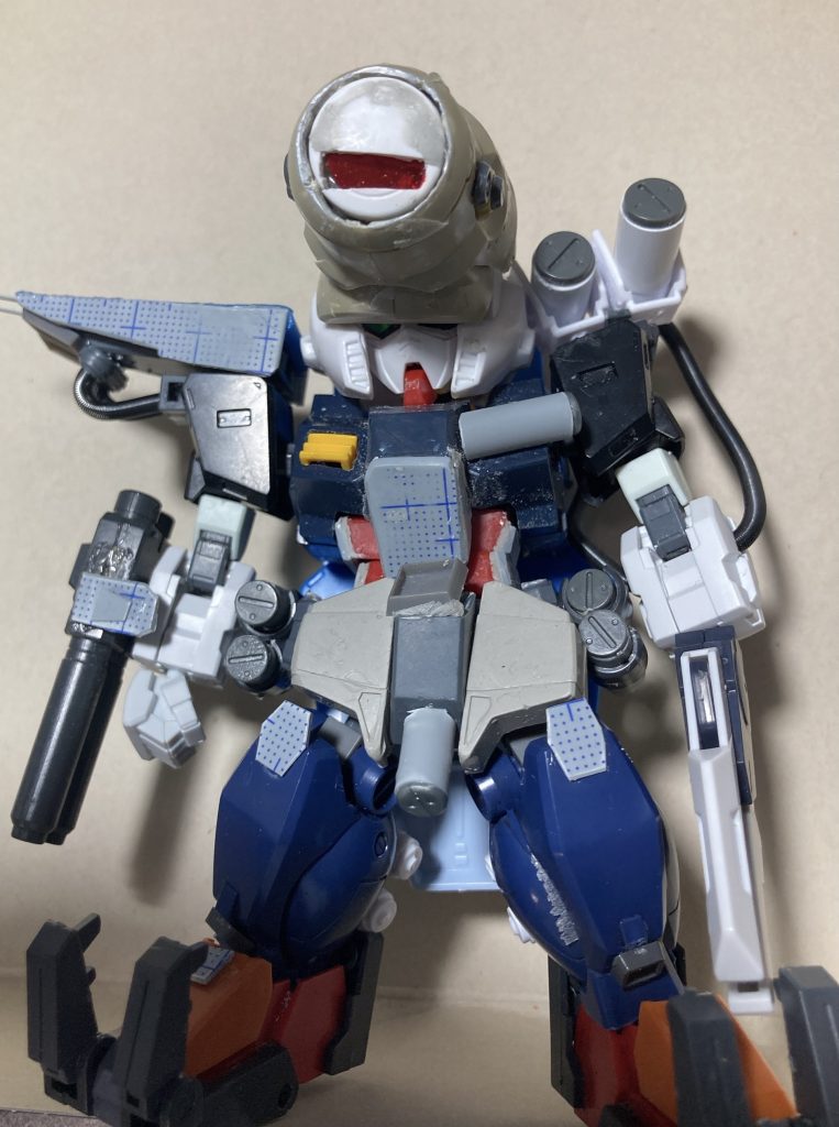 頭:ダブルゼータの頭部とジャスティマの肩身体:シルヴァバレトの胸にEGガンダムを埋め込む腕:ドライオンの肩に30mmラビオットの腕、ペンチはサタニクスウェポン、ライフルはレオパルドダヴィンチ脚:ジムクウェルのスネにジェガンブラストマスターのスリッパ、爪はシステムウェポンキット