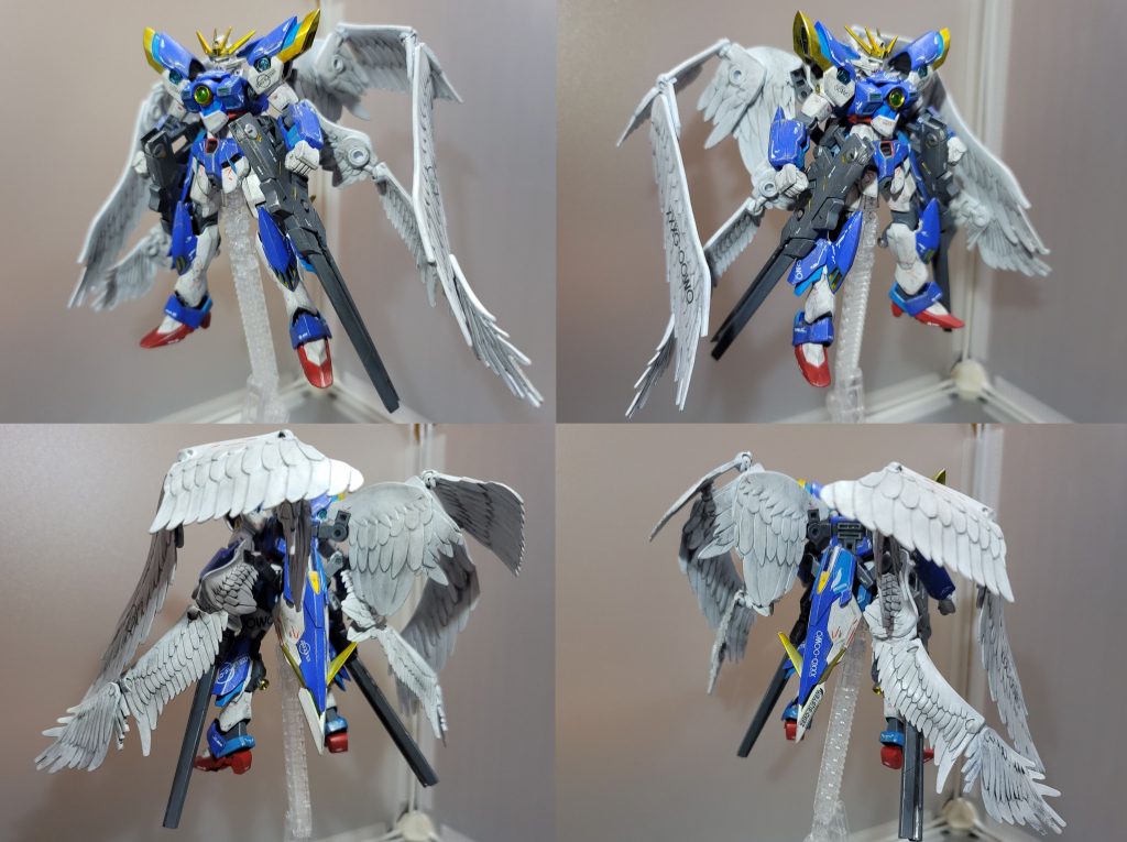 立ち姿4アングル本機の制作におけるコンセプトとして「ウイングゼロEWのキットを使わずにウイングゼロEWを作る」という前提があるそこで現在のウイングゼロEWの設定を何もかもちょっとズレた形で再現することにした：ウイングガンダムEWの外装→概ねフェニーチェリナーシタの方を使用、胸部に少しだけTV版ウイングトールギスフリューゲルの翼→そもそもHGACトールギスはまだ存在しないからスカイハイウイングスを投入プロトゼロフレーム及びゼロシステム→外観に繋がらない設定だが、敢えてそれを表現するものとして頭部と胸部にTV版ウイングゼロのパーツを移植ツインバスターライフル→TV版ウイングゼロのを使うのは芸がないと思ってMSGバーストレールガンを使用　これの見た目はトールギスⅢのメガキャノンと少し似ており、設定的に馴染むのでこれはこれでありと思う