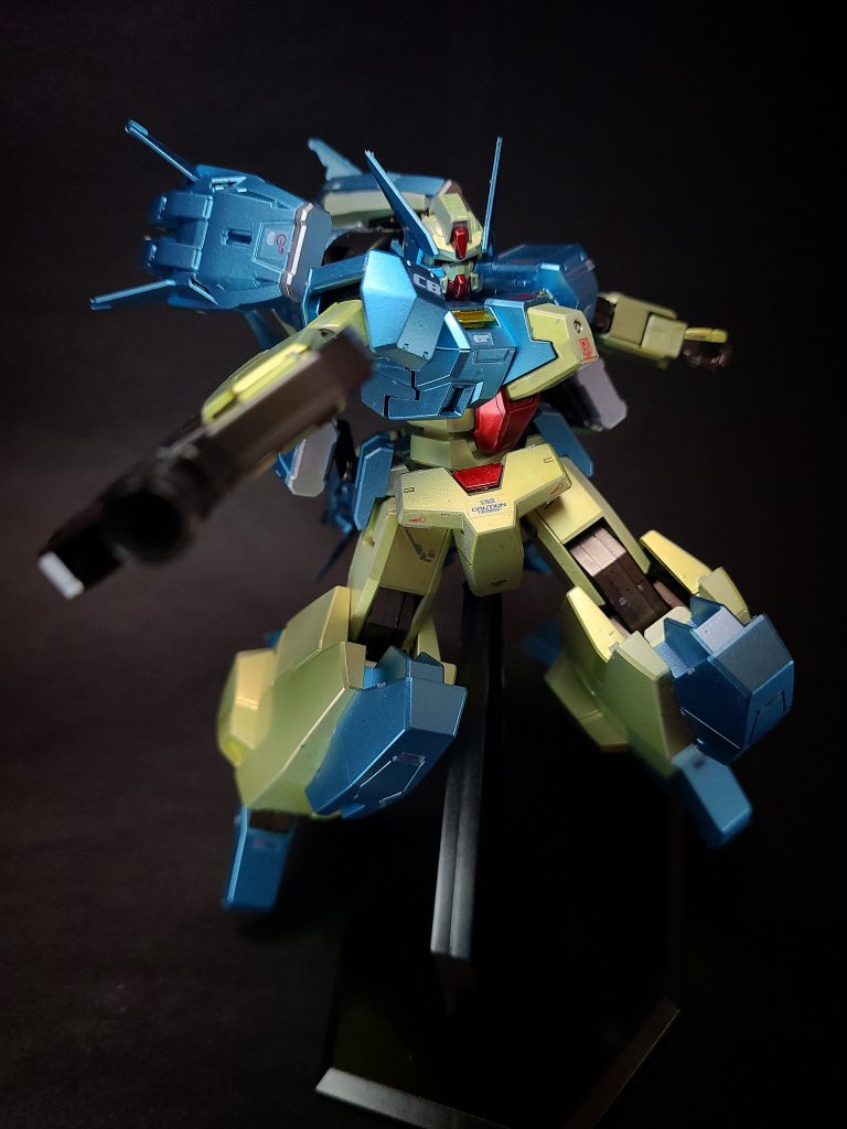 ガンダムビルドダイバーズ初登場作品。第5話でシャフリヤールがリクとユッキーにプトレマイオスアームズを貸し与え、ピンチに陥ったタイミングでシェヘラザード本体が登場。アームズと合体し圧倒的戦闘力で相手のザムドラーグ改造機を撃破した。その後、有志連合戦および第2次有志連合戦に参戦。後者では当初、運営側に就いてタイガーウルフのガンダムジーエンアルトロンと対決し、死闘の末、ビルドダイバーズ側に加勢。立ちはだかったAGEIIマグナムの必殺技でジーエンアルトロンと共に激しく損傷するも、他の無数のガンプラを相手に戦闘を継続した