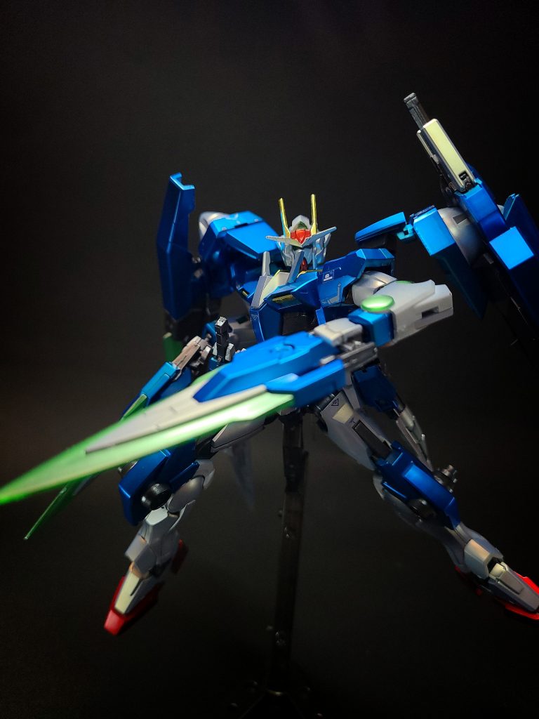 GNカタール -インドの刀剣カタール（厳密にはジャマダハル）をモチーフとした短剣。刃にクリアグリーンの新素材を採用した試作兵器で、GN粒子を熱変換することで超高温を生み出し、その熱を瞬間的に対象に伝導させることで高い切断力を発揮する。この素材は、GNソードIIIをはじめ以降に開発される武装にも採用された。左右のふくらはぎに増設されたハードポイントに1基ずつを懸架する