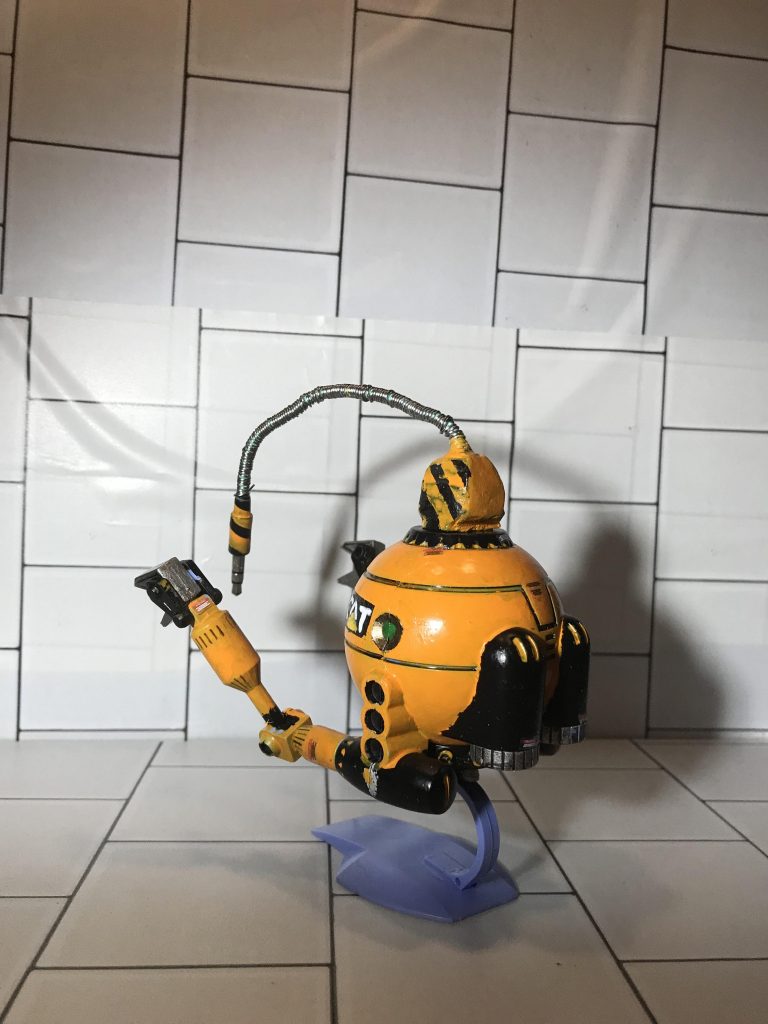 インスピレーションコミュニケーター通称 インコミ サイコミュがどのようなものかわからなかったコマツの技術者が作り上げたコンピュータによるサポート操作を脳波で行うようにしたコミュニケーション装置。装置それ自体への理解よりも直感での操作ができるモビルポッド熟練者の習熟が高かったことからこの名がついた。これを搭載したボールは0088年ごろから、連邦政府からの受注が多数あった。