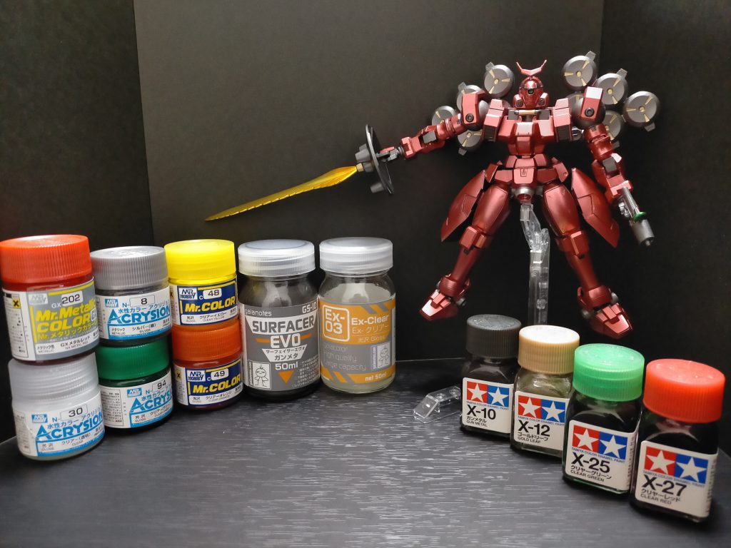 塗装レシピ下地:サフEVOガンメタトップコート:Exクリア銀(撮り忘れ):Exシルバー機体赤:GXメタルレッド機体関節武装:サフEVOガンメタビームサーベル:ガンメタ→シルバー→クリアイエロー→クリアオレンジ差し色塗り分けアクリジョン:シルバー、クリアグリーン、エナメル保護にクリアーエナメル:ガンメタ、ゴールドリーフ、クリアーグリーン、クリアーレッド年明けから初めてやっと完成!大掛かりな工作は初めてでしたが、色々勉強にもなったし楽しむ事ができました。今回は塗料3種使いましたが、エナメル塗料の保護にアクリジョンクリアを使ってみました。これによりラッカー系トップコートを使用してもエナメルが泣かないので、何も気にせず吹くことが出来たのが良かったです。もう缶トップコートを買う事は無さそうです(コスト的にも)(笑)去年のアクリジョン筆塗りのお蔭で塗装の幅が広がったのが少しは役に立ちました。次も何するかは決めているので、ぼちぼち着手します。最後までご覧頂き有難うございました(`・ω・´)ゞ1/2022
