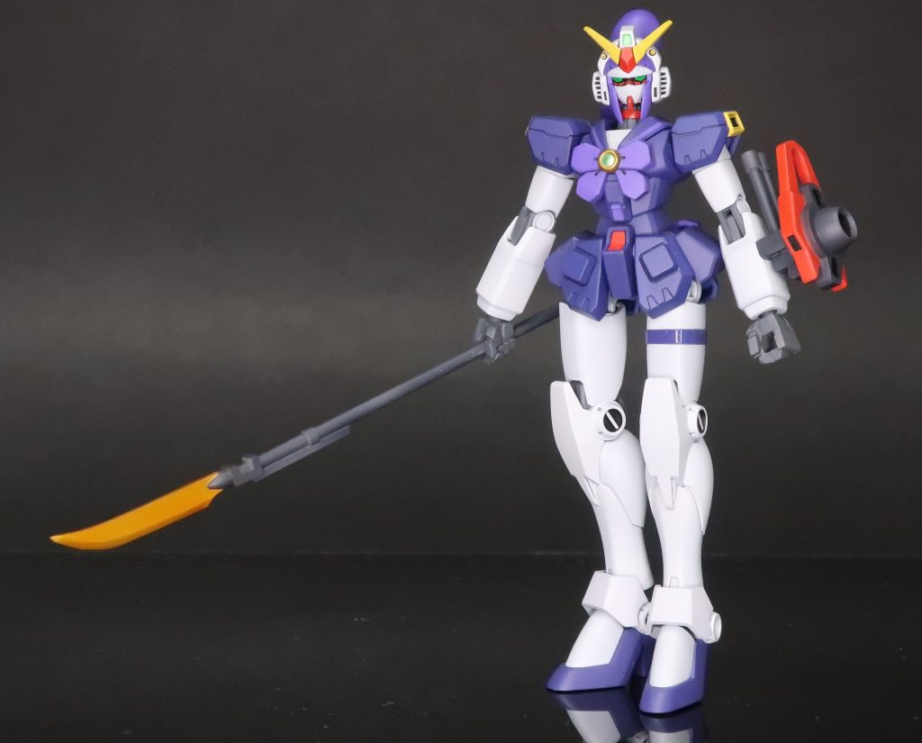 シグレ・マヒルの機体、ノーベル・M・ガンダム色換えと一部のシャープ化、つま先を丸く削り、後頭部とポニーテール部をプラ板積層から削り出しで製作。ナギナタは旧キットライジングを参考にスクラッチ、ビームボウは取り付け基部をスクラッチ。