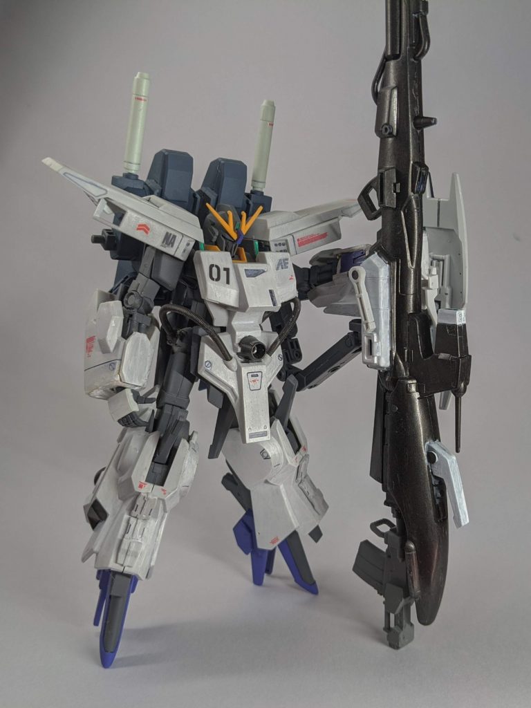 主兵装の一つであるハイパーメガカノンは改装が施され、ハイパーメガカノン改とされた。この改装に伴い、バックパックへの接続方法が改められている。この際にハイパーメガカノン改本体にサブジェネレーターが搭載され、エネルギー供給の面で機体にかかる負担を軽減させることに成功した。一方でこの改装によって縮退用リアクターの搭載スペースが確保できなくなったこと、リアクターの消耗が激しかったことから、リアクターを換装する機構が取り付けられている。(模型的に言うと180mmキャノンの弾倉部分を銃身後方に移植してます。)