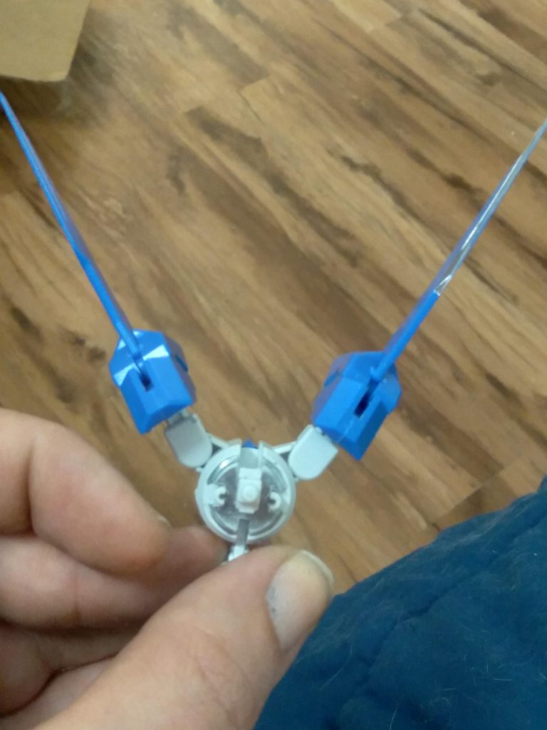 With some cutting and gluing, I made some thruster pods with wings