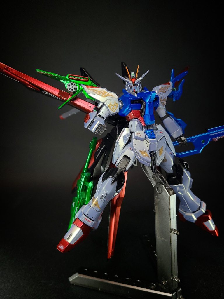 初出作品。第2話から登場。ガンダムヘリオスとガンダムリヴランスヘブンとチームを組み、GBフェスタに参加していたところ、ガンダムバルバタウロスとランナープリズンの襲撃によって行動不能に陥ってしまう。しかし、カドマツのサポートとミサやタクマの加勢などを受け、仲間と全力を尽くしてバルバタウロスを撃破した