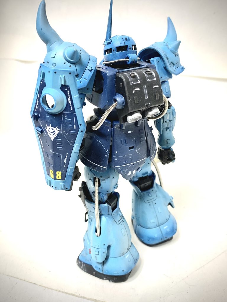 スカート延長して、ディテールはアシンメトリーで