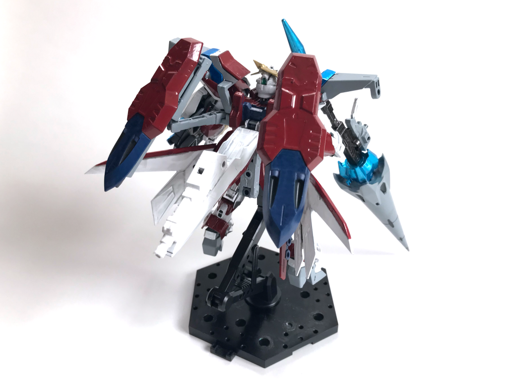 ロータスミッションを通してオーガから受けた「(防御が)堅いだけで旨味が無ェ」というアドバイスを基に、「攻撃的な防御」をコンセプトにしてイージスナイトをリビルドしたガンプラ、という設定。今回は「武装の強化」「攻撃力の向上」「モードの追加」を行いました。∞ジャスティスのフレームを使用しておりPS装甲が関節にも展開されます。そのため形式番号は∞ジャスティスのものになってます。