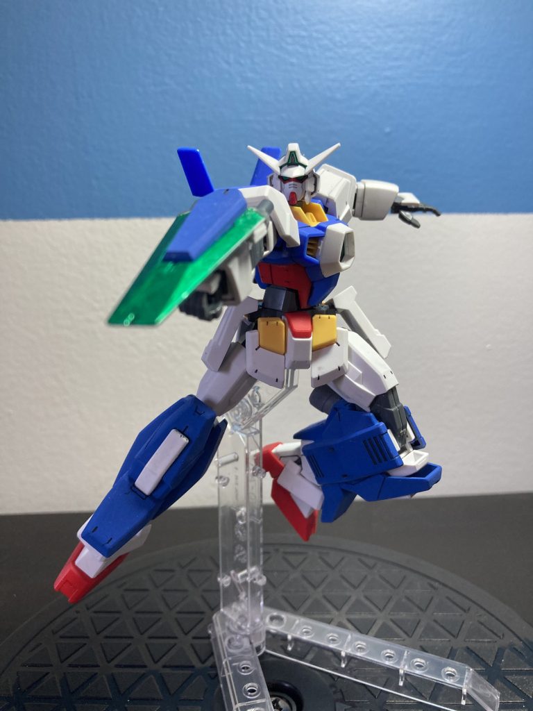 One of its main functions is the ability to eject armor to reproduce the wear of the AGE-1. The first of these wares is the AGE-1 Half Spallow. It uses leg armor and a sigle shield (twin DODS beam gun turned inside out ) to hide the needle missile launcher in each leg armor.  