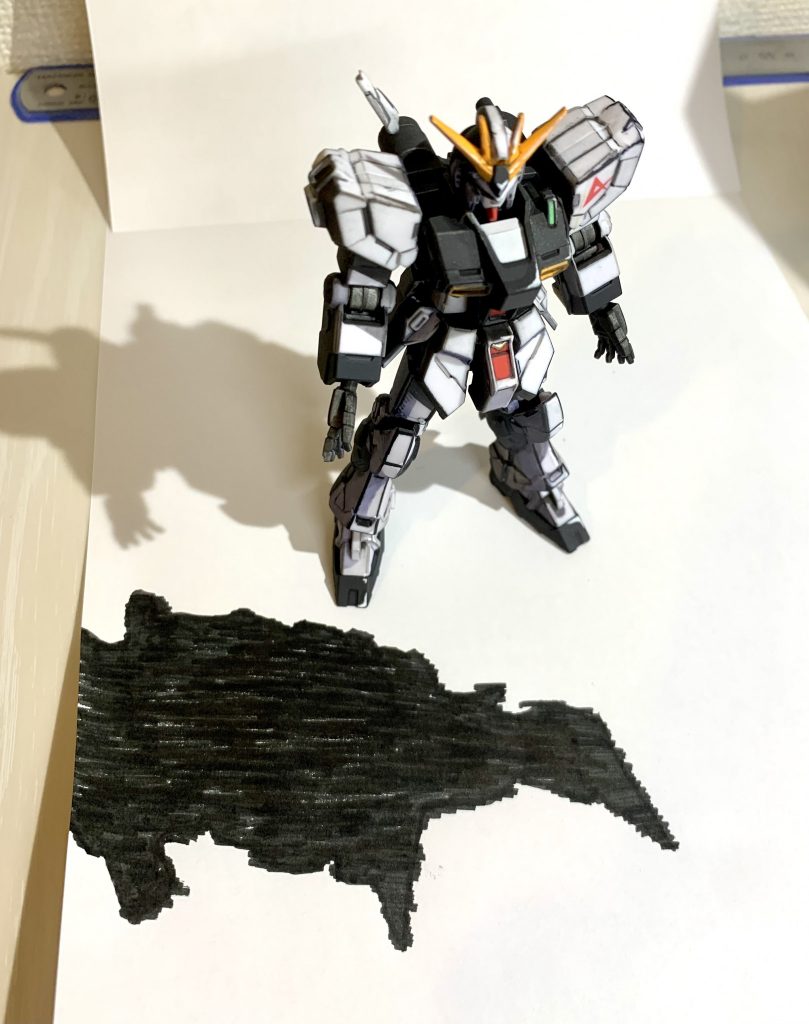 撮影風景です。白い紙を背景にして影を手書きにしたらイラストっぽくなりました。