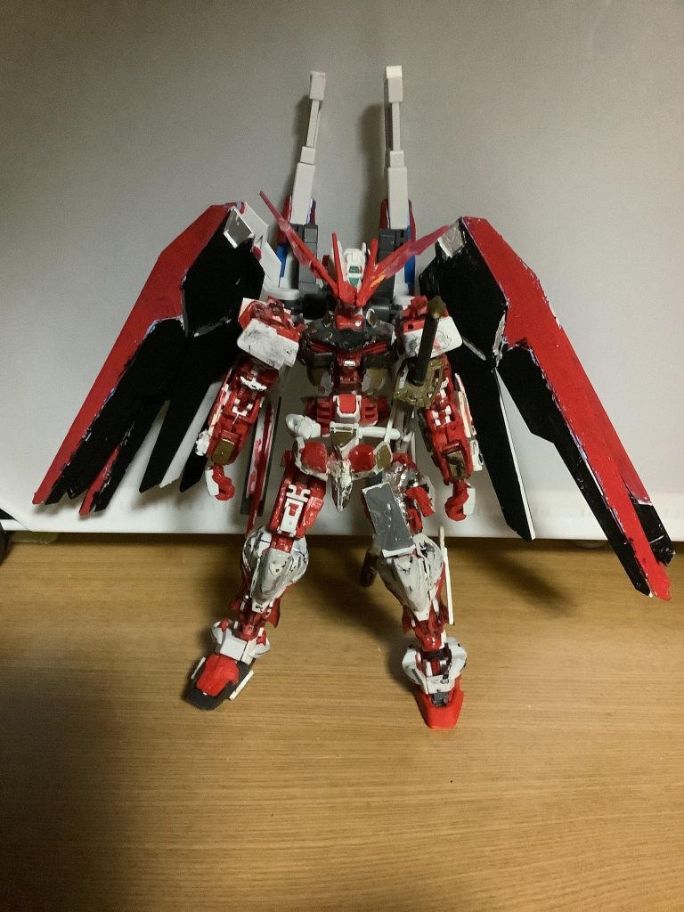 RXーHー078ガンダムガイルスのちに宇宙全体を揺るがす「銀河改心戦争」にて活躍したMS。戦時中、最もMS撃墜したガンダムである。ちなみに無所属。宇宙を自由に飛びまわり敵機撃墜をする姿から天空神ウーラオスのローマ神話の別名ガイルスからつけられた。説明はこのくらいでしょうか。バックパックはフリーダムのものに(ヘリオスだけど)ヘッドはアストレイのものを無理矢理4本づのしました。