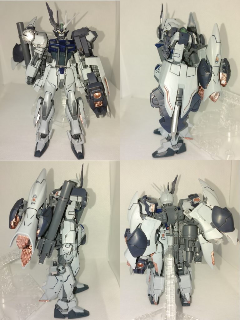 ストライカー装備時。FνU以外のパーツは主にMSGフォールディングアームを使用しています。 バックパックブースターはFνU下足装甲をほぼまるまる使用し、シールドとしてFνU後腰アーマーにFνUの足を貼り付けました。 それだけだと武器が一つもなかったので、同じく部屋の隅でほこりをかぶっていたMSGフォールディングキャノンを追加し、差し替え用のパイルバンカーの杭をシールドにつけました。 そのほか各所細かい可動部はMSGのジョイントセット等の手元に余っていたものを使用しています。