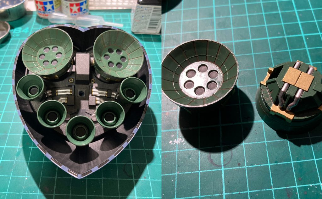 ある意味ジオングの一番の見せ場であるスカート内部。黒鉄色と焼鉄色の使い分け、シリンダーの金銀でメタリックながらも渋く仕上げたつもりですが、写真じゃ全く伝わらない。そしてメインバーニアの付け根部分も金銀で塗分けていますが、見ようとしても全く見えない場所にここまでやる必要はあるかと言われそう。ですがそこは自己満足の範囲なので必要ありますという解答をさせて頂きます。あとは、ビルドファイターズの世界ならこういう所の作り込みが性能差となって現れるだろうと思った所存です。