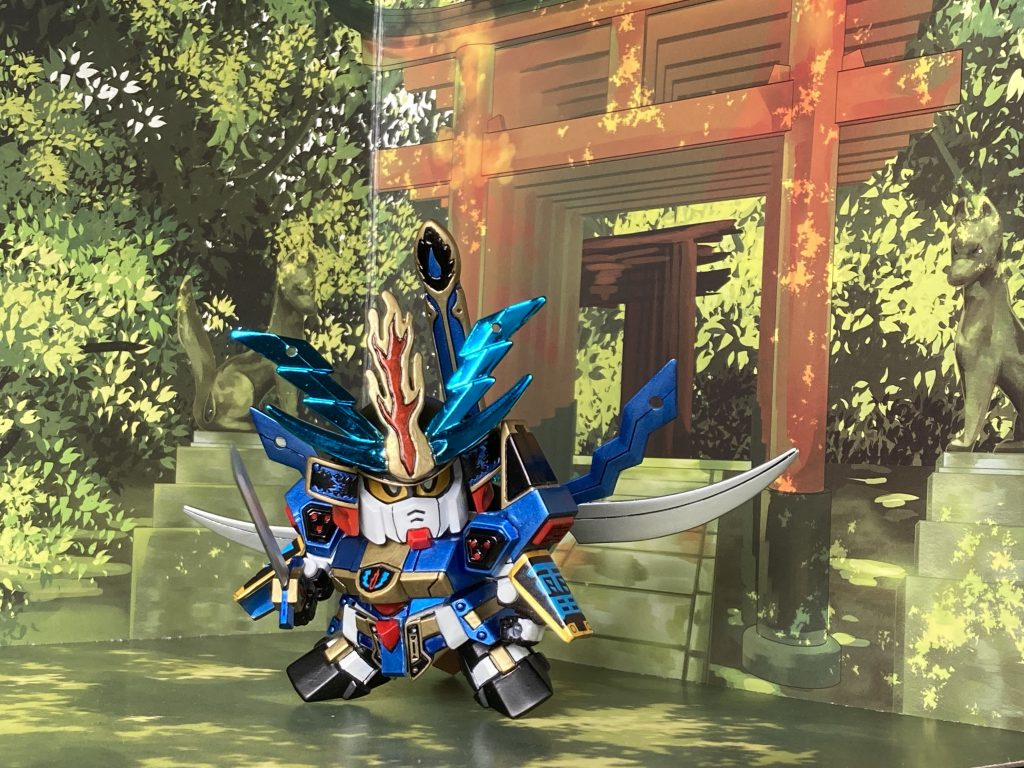 百均の背景シートと共に。初代大将軍を兄に持ち、後の二代目大将軍、三代目大将軍を育てる。実はSD戦国伝最大の功労者なのではと思います。ちなみに頑駄無の世界では兄が赤、弟が青のケースが多いのは何故だろう。(大牙と飛天、爆進丸と鋼丸)