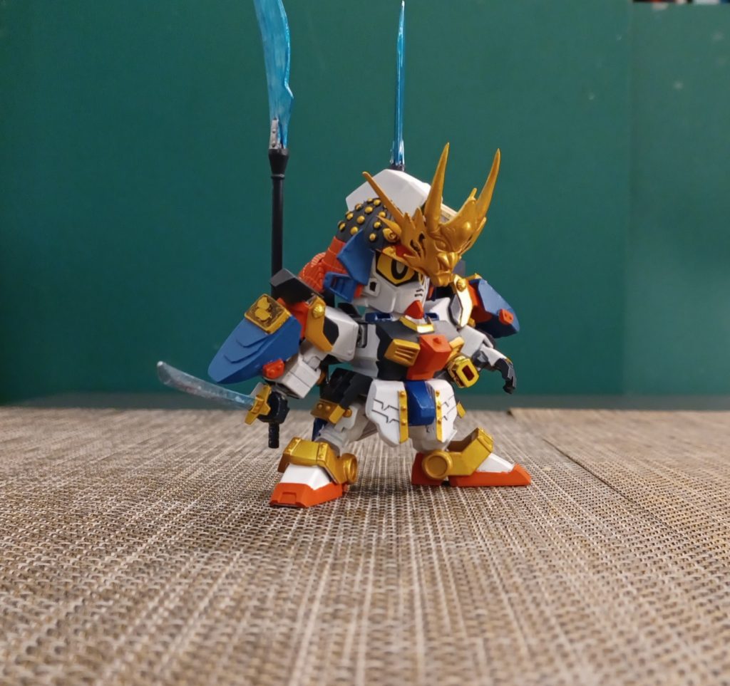 次代－暮荒烈驅主，這次是由gundam an-01twilight axis主機為 概念改造武者，配色上是参考原武者荒烈，今次亦加册入我的百鬼糸列一角中的武士。–5枚目/制作者：@kcwong13002623